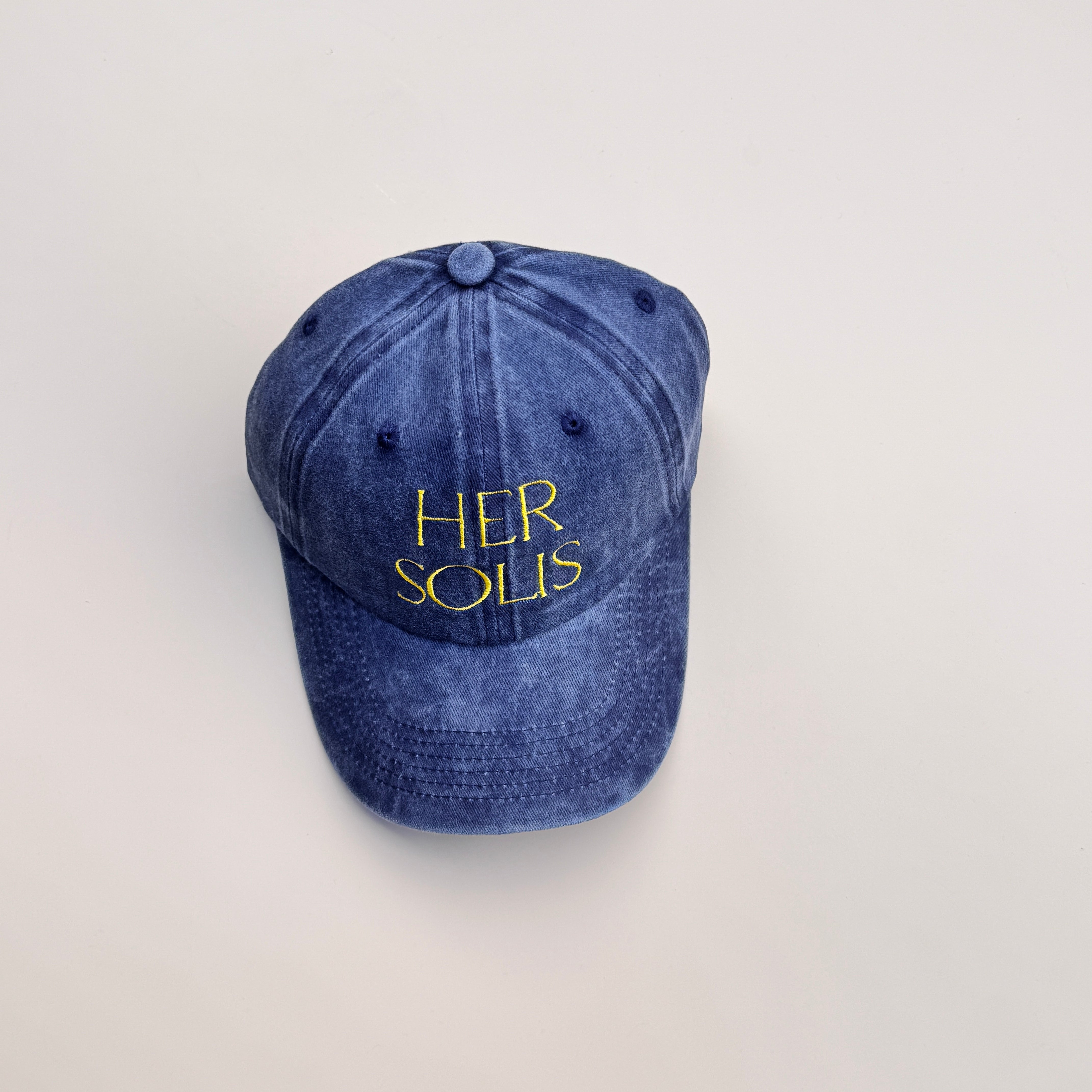 Her Solis Cap
