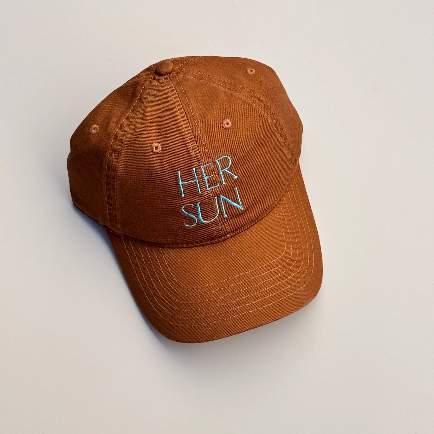 Her Solis Cap